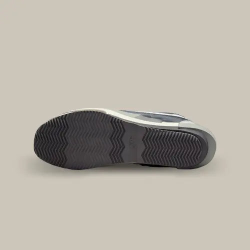 La semelle de la Nike Cortez 4.0 Sacai Iron Grey de couleur grise.